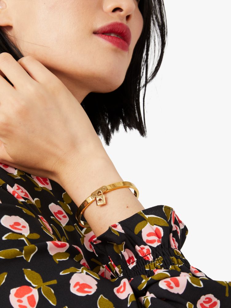 Women's gold. lock and spade charm bangle | Kate Spade New York NL