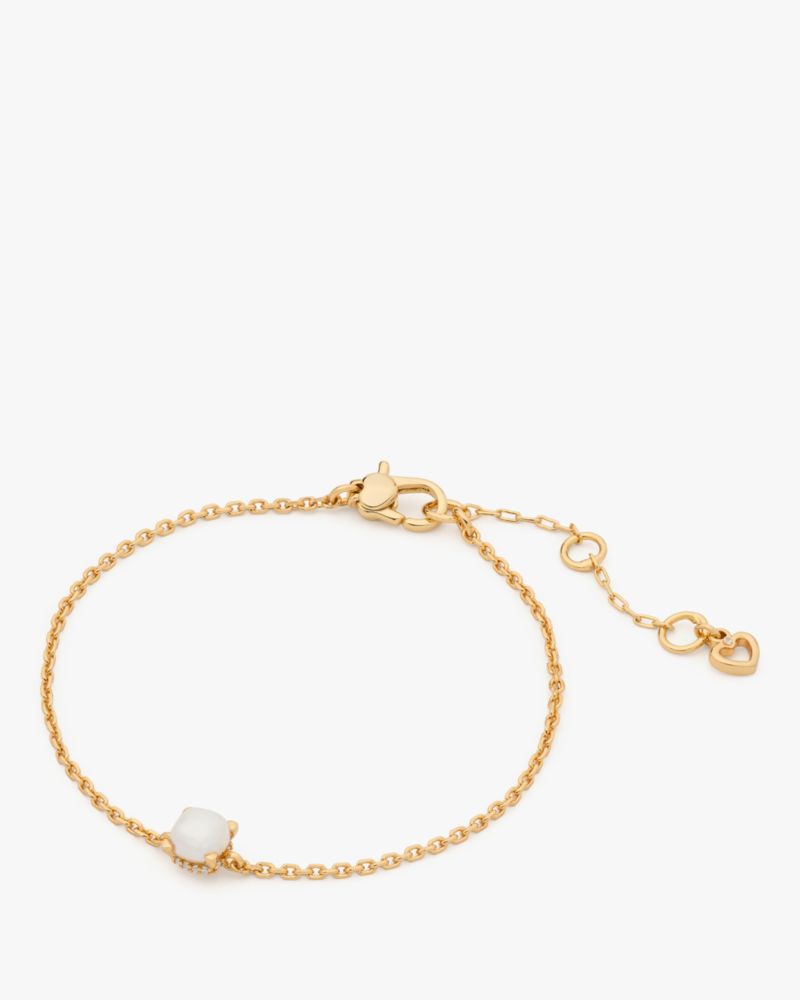 Shop Kate Spade Little Luxuries Solitaire Bracelet In Cream/gold