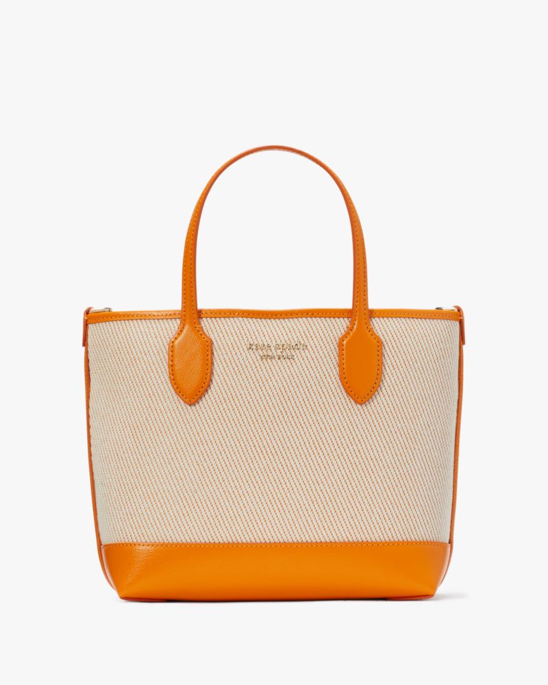 Shop Kate Spade Bleecker Canvas Medium Crossbody Tote In Turmeric Root