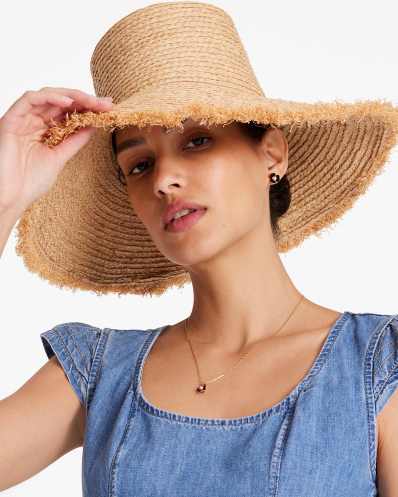 Kate Spade Fringed Straw Bucket Hat. 1